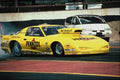 573000 A Canary yellow Firebird Spins Its Tires To Heat Them Up A4 Photo Print