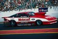 573005 A Potent Ford Probe Waits For The Lights To Turn Green A4 Photo Print