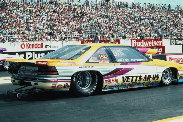573027 A Sleek Pro Stock Waits To Put On A Show For The Fans A4 Photo Print