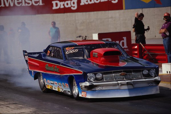 573040 An Evil looking Mercury Comet Approaches The Start Line A4 Photo Print