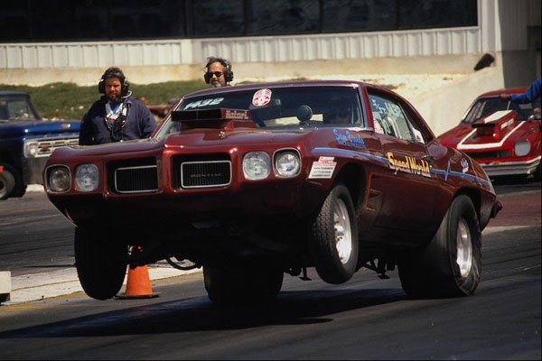 573048 A Firebird Sticks Its Front Wheels Way Up In The Air A4 Photo Print
