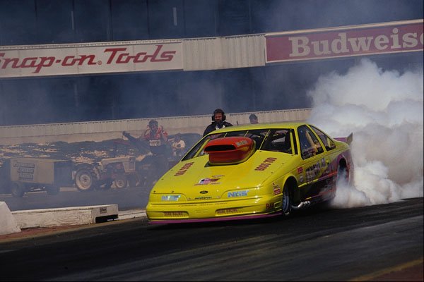 573049 A 700 Cubic Inch Thunderbird Makes Lots Of Tire Smoke A4 Photo Print