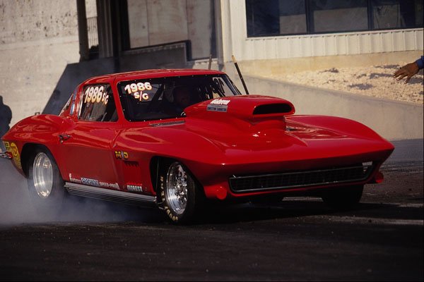 573051 A Beautiful '64 Corvette Coupe Flexes Its Muscles A4 Photo Print