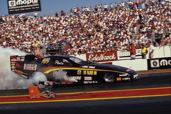 573054 A Funny Car Thrills The Fans With A Tire smoking Burnout A4 Photo Print
