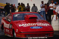 573059 A Sleek Ford Pro Stock Crouches Moments Before Takeoff A4 Photo Print
