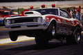 573072 A Super Stock Camaro Pulls A Crowd pleasing Wheelstand A4 Photo Print