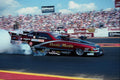 573074 A Funny Car Shrouds The Track In A Cloud Of Smoke A4 Photo Print
