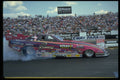 573077 Bunny Burkett's Alky Funny Car Completes A Smoky Burnout A4 Photo Print