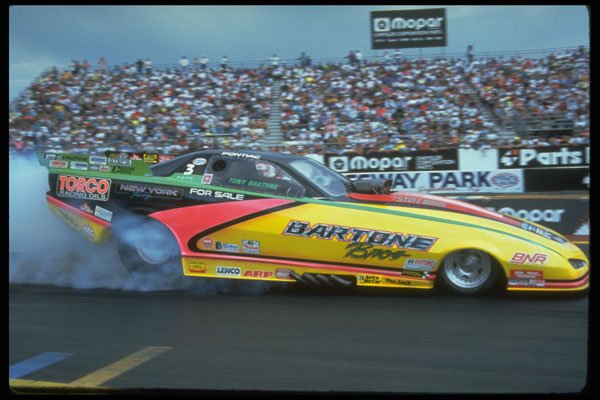 573083 Smoke Billows From The Tires Of An Alcohol Funny Car A4 Photo Print