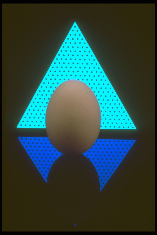 577000 Freestanding Egg Against Geometric Background A4 Photo Print