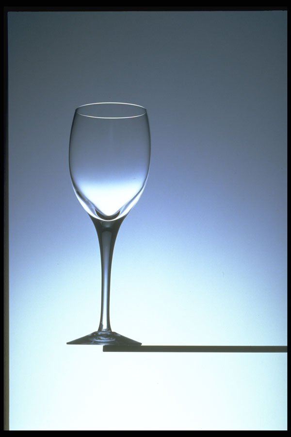 577047 Glass Balanced On The Edge Of A Table A4 Photo Print