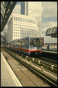 578047 Dockland Light Railways Approaching Heron Quays Station A4 Photo Print
