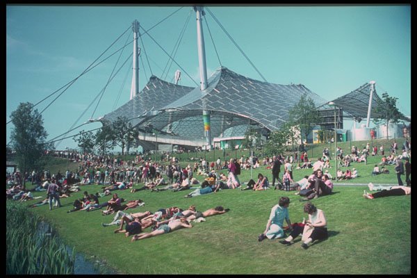 580010 Sunbathing Near The Olympic Stadium In Munich, Bavaria A4 Photo Print