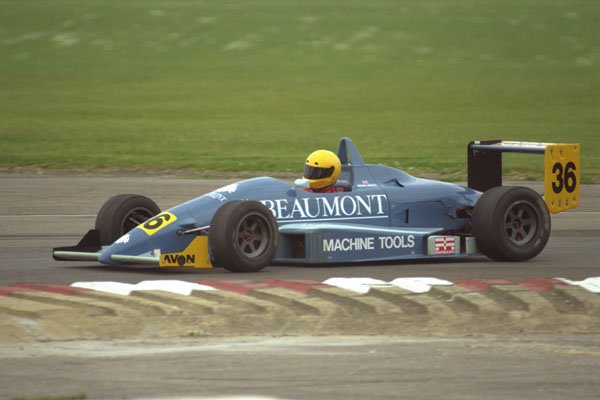 582075 Blue Formula 3 Racing Car On Circuit A4 Photo Print