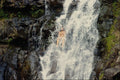 589053 Sitting Under The Waterfall A4 Photo Print