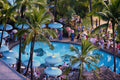 589077 Senior Citizens Partying Around The Outrigger Hotel Pool A4 Photo Print