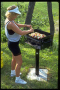 592000 Young Woman Cooking Shish Kabob, New York A4 Photo Print