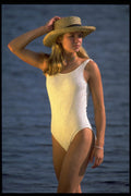 592001 Girl In Bathing Suit Holding Hat A4 Photo Print