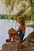 592010 Young Girl Sitting On The Shore A4 Photo Print