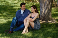 592040 Couple Sitting By Tree A4 Photo Print
