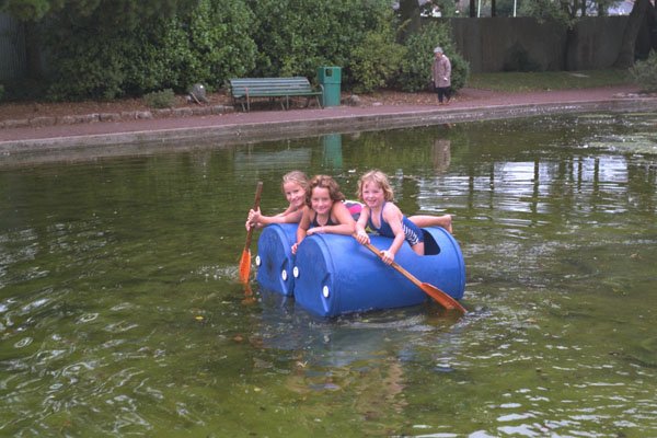 592085 Three Girls On A Blue Raft In Duck Pond A4 Photo Print