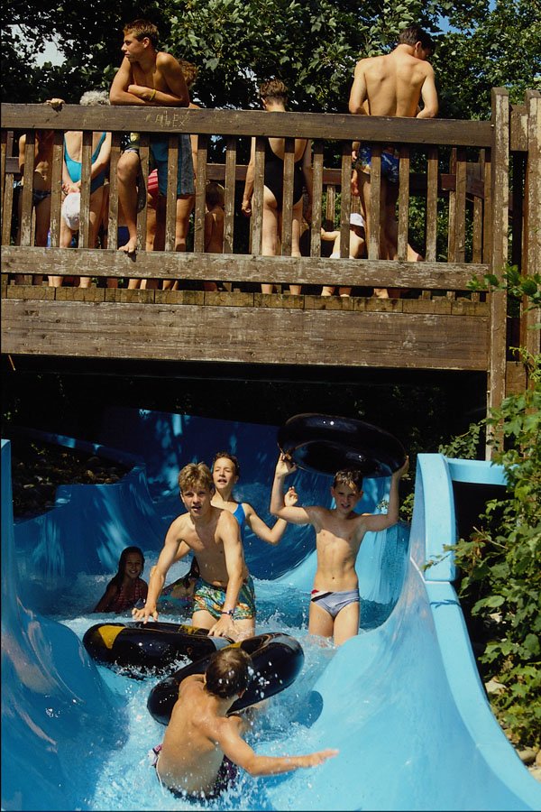 592094 Children On A Waterslide, Open Air Pool A4 Photo Print
