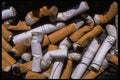 593009 Cigarette Butts In Ashtray A4 Photo Print