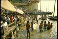 595018 Ablutions On The Ghats By The Ganges River, Varanasi A4 Photo Print