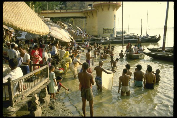 595018 Ablutions On The Ghats By The Ganges River, Varanasi A4 Photo Print