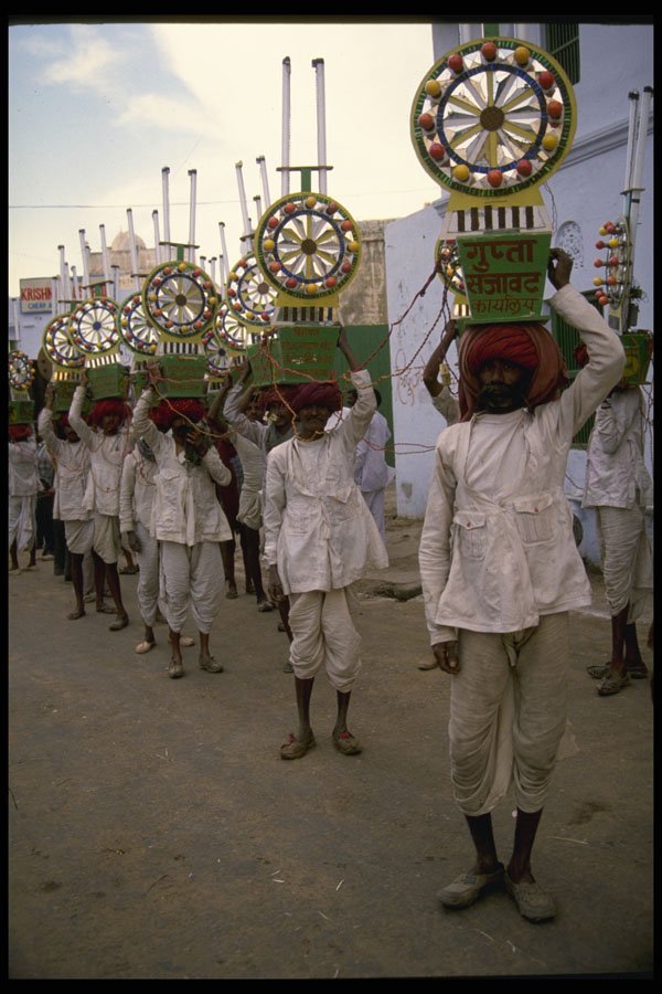 595031 Light Bearers At Indian Wedding, Pushkar, Rajasthan A4 Photo Print