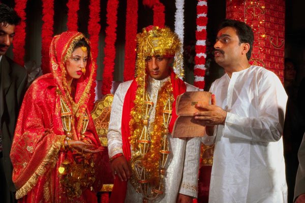 595086 Wedding Couple And Priest A4 Photo Print