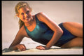 596049 Girl Lying On Sand A4 Photo Print