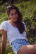 596056 Model With Long Black Hair And Cut off Denim Shorts A4 Photo Print