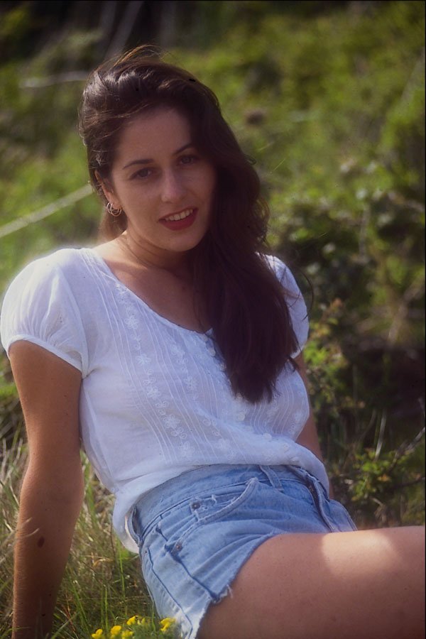596056 Model With Long Black Hair And Cut off Denim Shorts A4 Photo Print