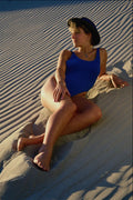 596067 Girl Sunbathing On Dunes A4 Photo Print