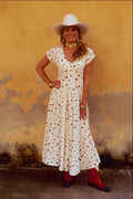 596092 Western Desert Fashion Against Textured Wall A4 Photo Print