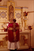 597079 Priest Elevating Chalice At Mass, East Grinstead, England A4 Photo Print