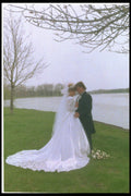 598003 Bride And Groom By The Water A4 Photo Print