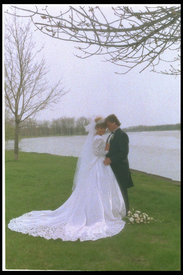 598003 Bride And Groom By The Water A4 Photo Print