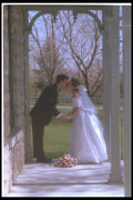 598004 Bride And Groom Leaning To Kiss A4 Photo Print