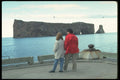 598009 Couple Viewing Famous Perce Rock On Gaspe Coast, Quebec A4 Photo Print