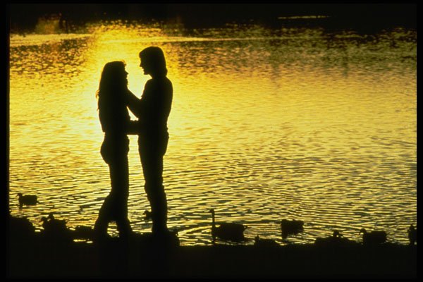 598012 Couple By Lake At Sunset A4 Photo Print