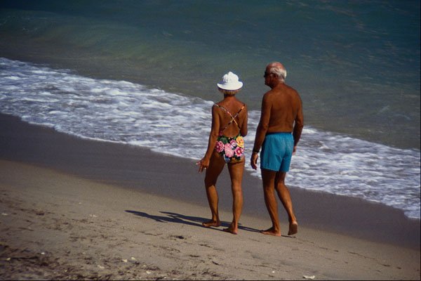 598060 Senior Beach Walkers A4 Photo Print