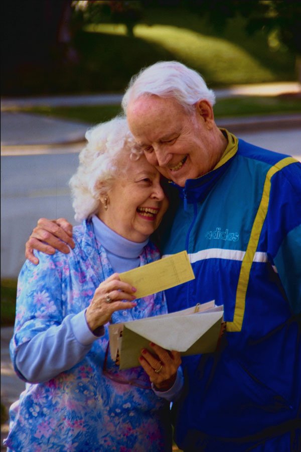 598092 Husband And Wife Receiving Mail A4 Photo Print