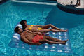 598099 Couple Relaxing In The Pool A4 Photo Print