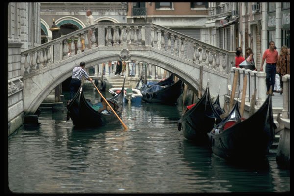 606016 Gondolas With Tourists Going Under Bridge, Venice, Italy A4 Photo Print