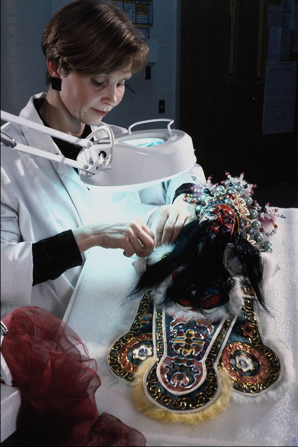 609017 Restoring A Native Costume In The Conservatory Laboratory A4 Photo Print