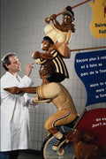 609018 Preparing A Colourful Sign For The Exhibition Halls A4 Photo Print