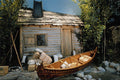 609023 Trapper's Canoe In Front Of The Fur Trader's Cabin A4 Photo Print