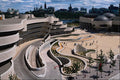609044 The Museum's Architecture Curves Around Its Entrance Plaza A4 Photo Print
